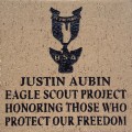 Engraved justin aubin logo brick